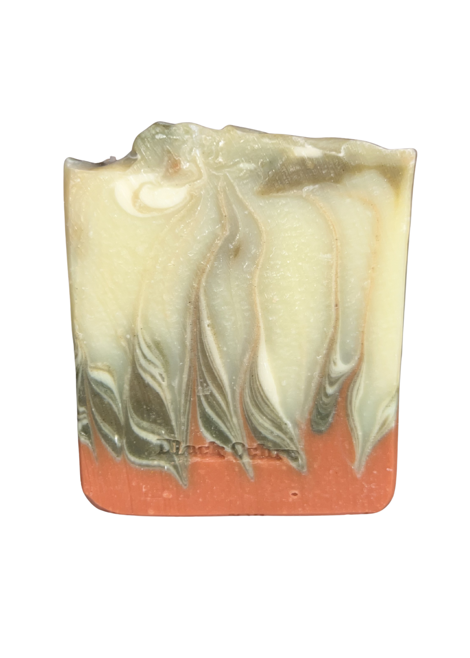 Decorative candle with wavy design on a white background